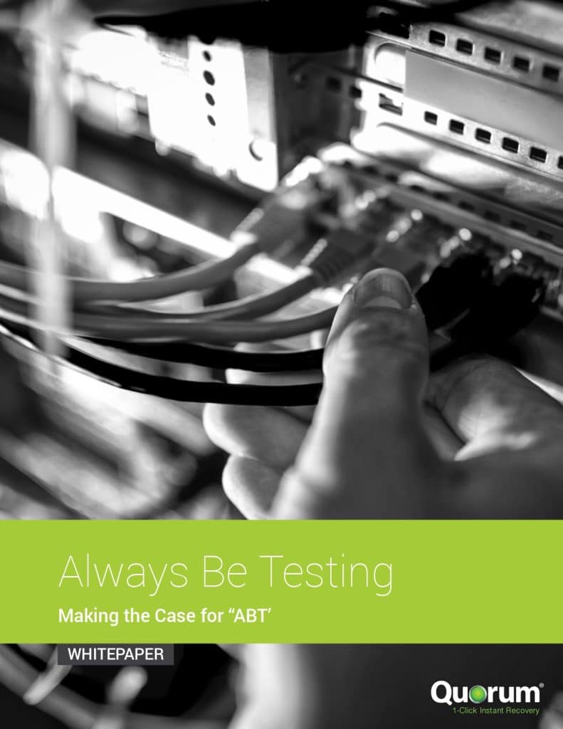 A black and white image of a hand connecting or disconnecting an Ethernet cable in a server room or data center. The title "Always Be Testing" and subtitle "Making the Case for 'ABT'" are overlaid in white text on a green background at the bottom. The Quorum logo is in the bottom right corner.